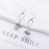 Korean bow tassel earrings asymmetric pearl flower earrings