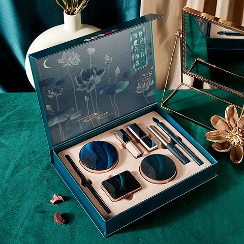 A Box Of Eight-Piece Floral Jade Jade Makeup Set