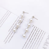 Korean bow tassel earrings asymmetric pearl flower earrings