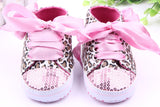 Leopard print shoe head baby shoes.