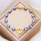 Women's High-grade Stainless Steel Blue Eyes Fashion Hollowed-out 26 Letter Bracelet