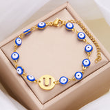 Women's High-grade Stainless Steel Blue Eyes Fashion Hollowed-out 26 Letter Bracelet